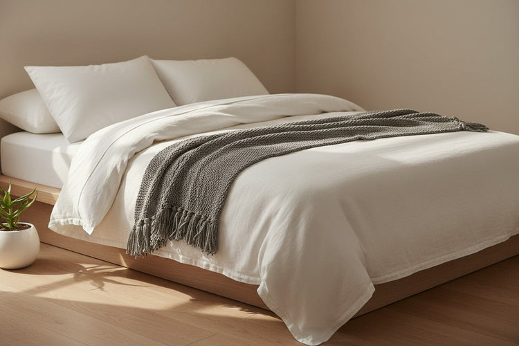 Japandi bedding sets in washed cotton, lyocell, bamboo, linen and Tencel. Duvet cover sets in soft neutral tones — solid colours, houndstooth and reversible designs for a calm, considered bedroom.