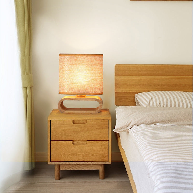 Solid Wood Arch Base Linen Table Lamp – Nordic Japandi Bedside Light, night lights, front view, with calming Nordic