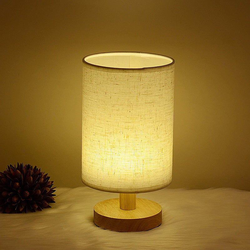 Solid Wood & Linen Fabric Table Lamp – Warm Ambient Bedside Light, night lights, front view, with calming Nordic simplicity