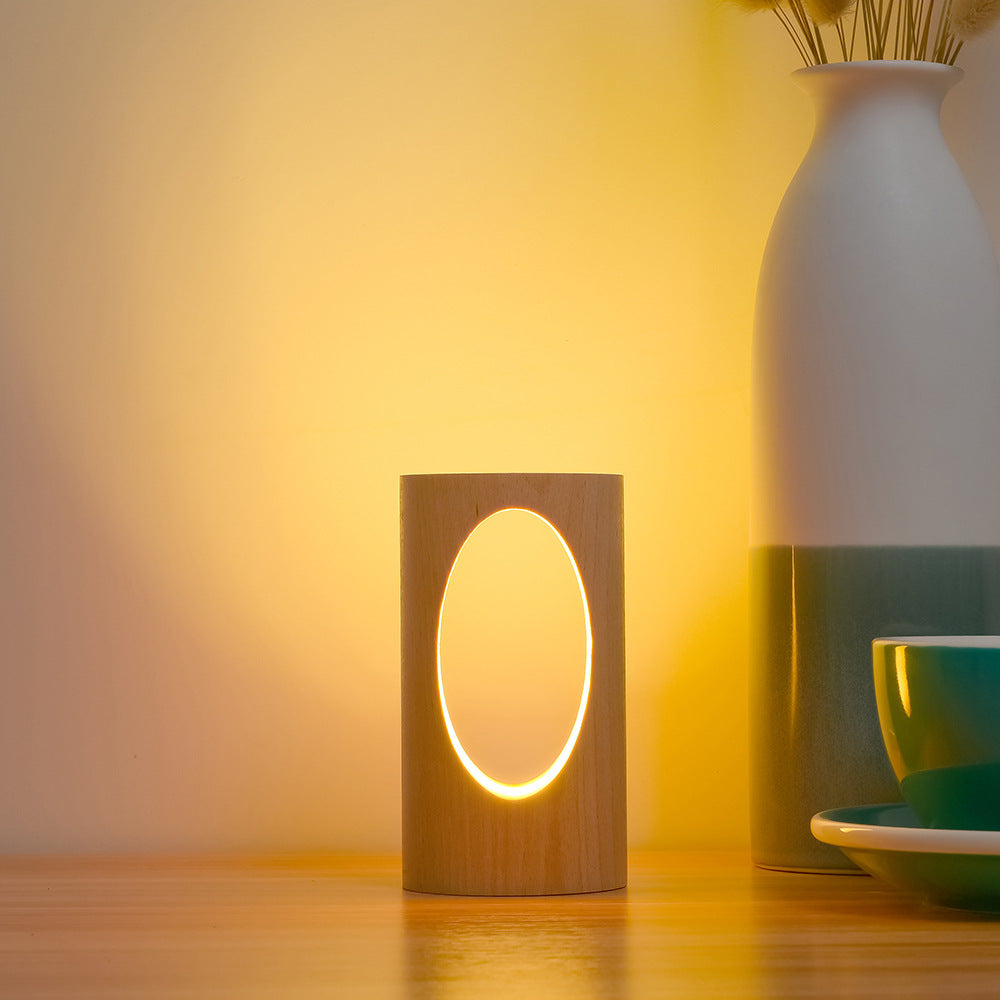 Solid Wood Hollow LED Table Lamp – Sculptural Warm Glow Light, night lights, in a styled setting, in soft neutral organic